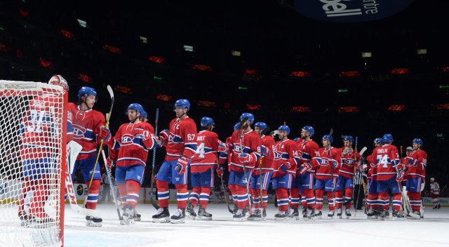 MONTREAL, QC - NOVEMBER 24: The Montreal Canadiens celebrate after defeating the the Carolina Hurricanes in the NHL game at the Bell Centre on November 24, 2016 in Montreal, Quebec, Canada. (Photo by Francois Lacasse/NHLI via Getty Images)